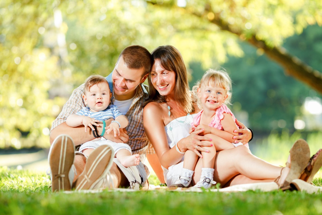 Happy family enjoying in the park